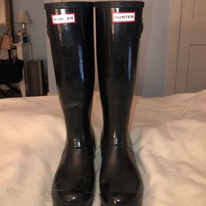 Tall black hunter rain boots